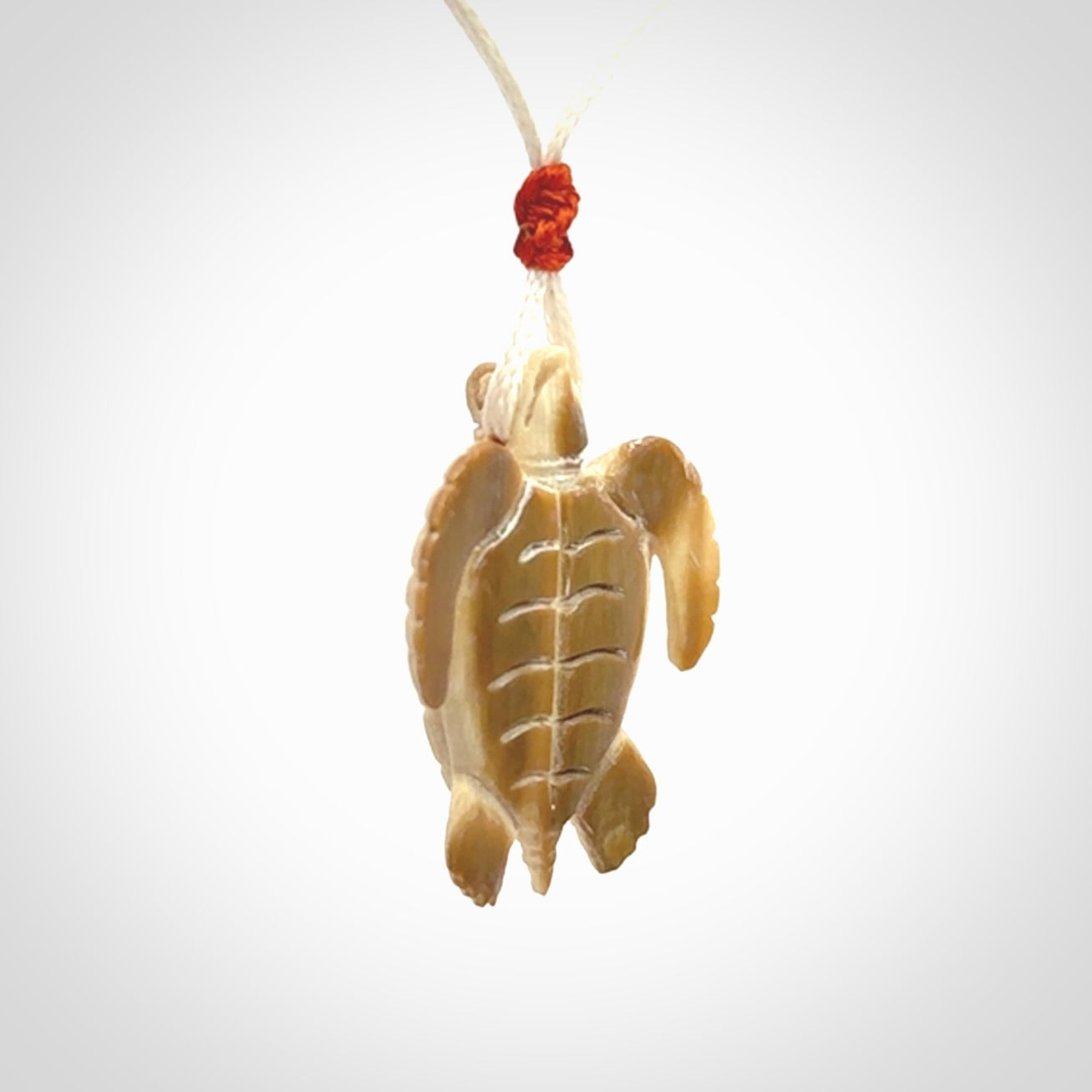 This is a beautiful hand carved woolly mammoth tusk turtle pendant. A really cool piece that is made from this rare and beautiful material. The mammoth has a very distinctive grain and each piece is different. We ship this worldwide and the cost of shipping is included in the price.