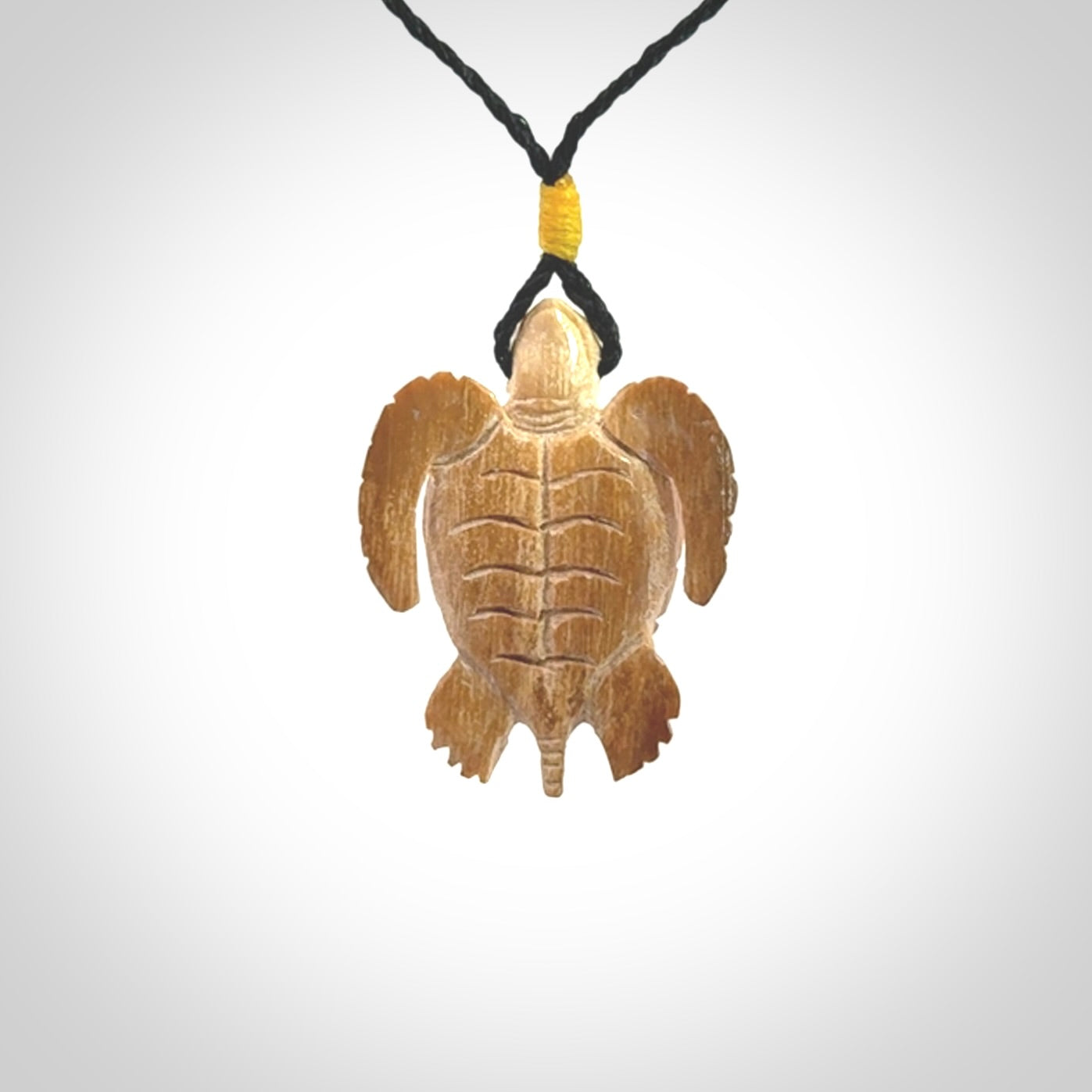 This is a beautiful hand carved woolly mammoth tusk turtle pendant. A really cool piece that is made from this rare and beautiful material. The mammoth has a very distinctive grain and each piece is different. We ship this worldwide and the cost of shipping is included in the price.