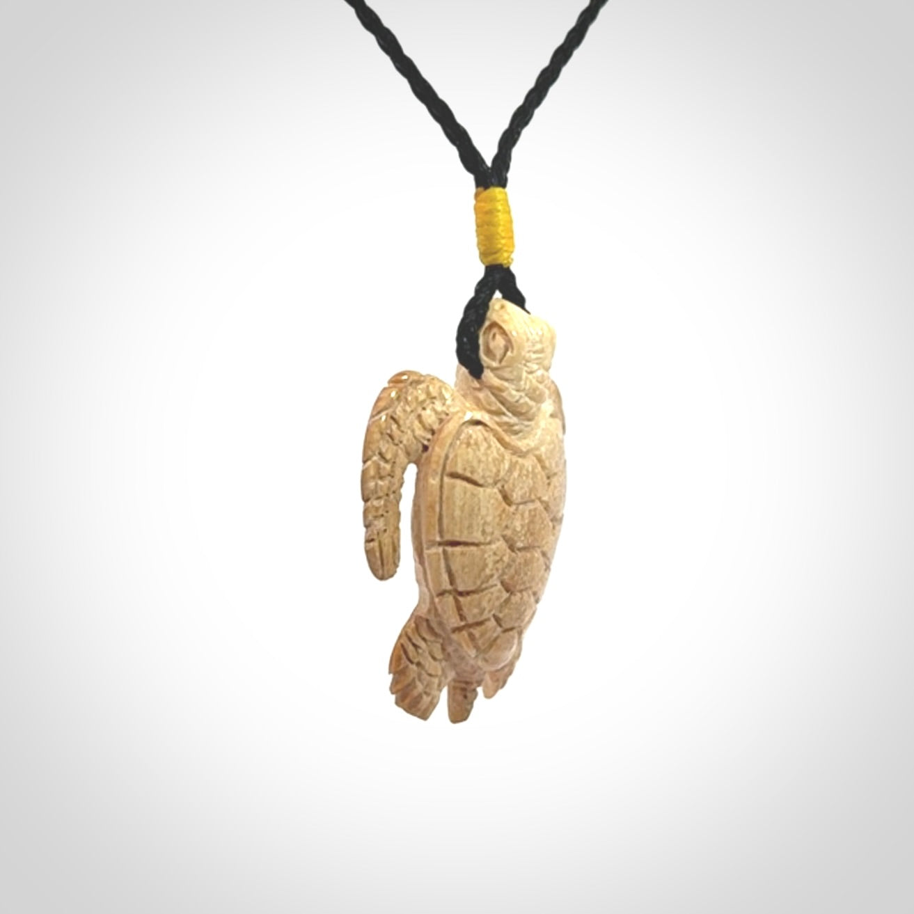 This is a beautiful hand carved woolly mammoth tusk turtle pendant. A really cool piece that is made from this rare and beautiful material. The mammoth has a very distinctive grain and each piece is different. We ship this worldwide and the cost of shipping is included in the price.