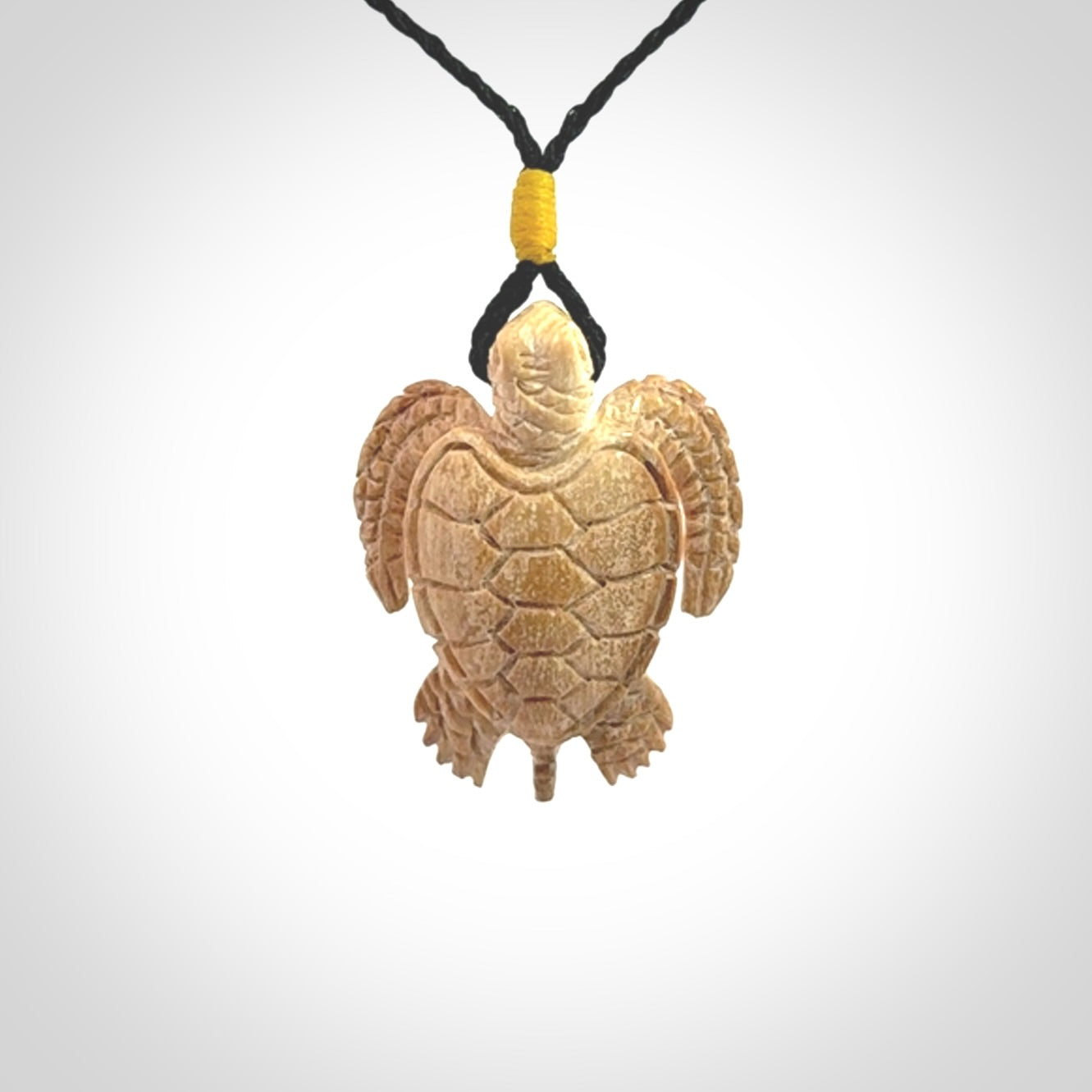 This is a beautiful hand carved woolly mammoth tusk turtle pendant. A really cool piece that is made from this rare and beautiful material. The mammoth has a very distinctive grain and each piece is different. We ship this worldwide and the cost of shipping is included in the price.