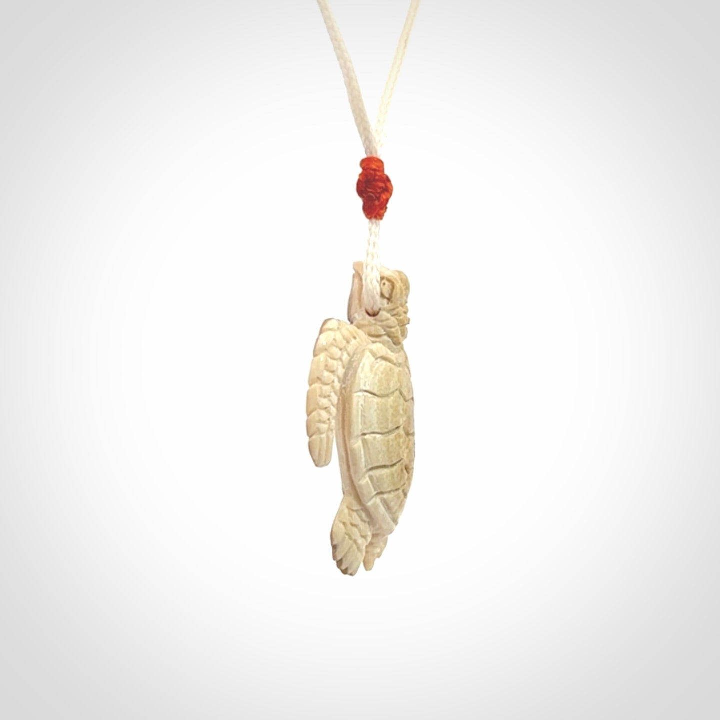 This is a beautiful hand carved woolly mammoth tusk turtle pendant. A really cool piece that is made from this rare and beautiful material. The mammoth has a very distinctive grain and each piece is different. We ship this worldwide and the cost of shipping is included in the price.