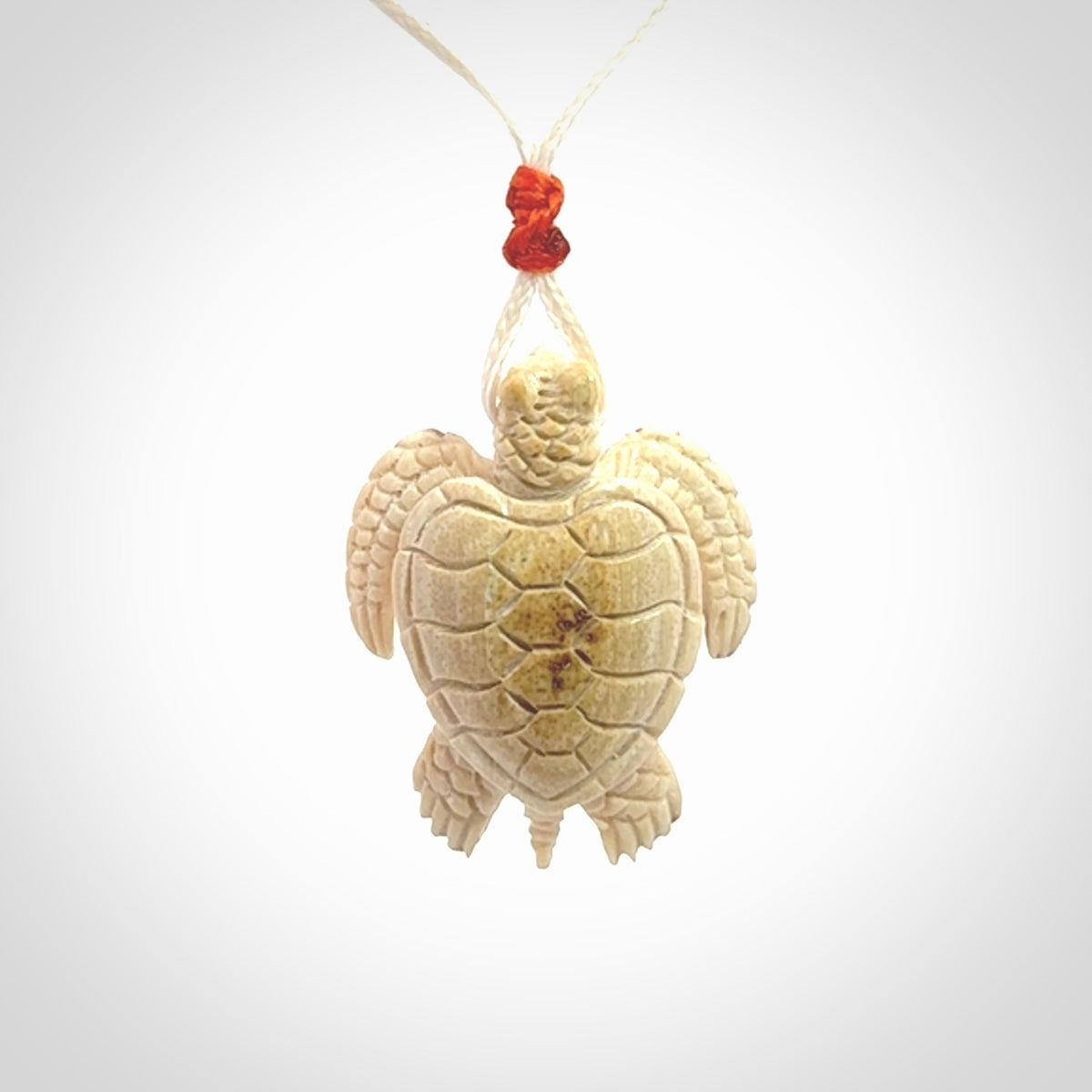 This is a beautiful hand carved woolly mammoth tusk turtle pendant. A really cool piece that is made from this rare and beautiful material. The mammoth has a very distinctive grain and each piece is different. We ship this worldwide and the cost of shipping is included in the price.