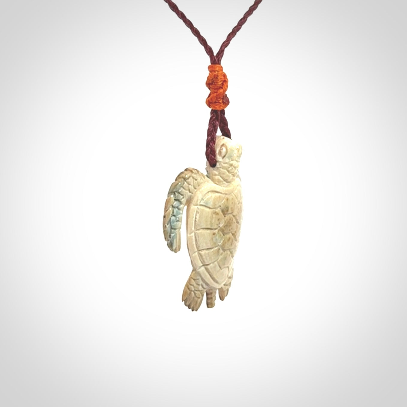 This is a beautiful hand carved woolly mammoth tusk turtle pendant. A really cool piece that is made from this rare and beautiful material. The mammoth has a very distinctive grain and each piece is different. We ship this worldwide and the cost of shipping is included in the price.