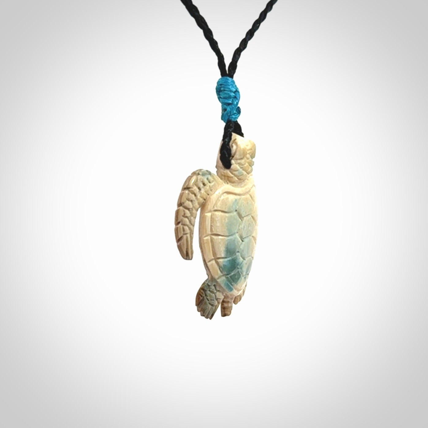 This is a beautiful hand carved woolly mammoth tusk turtle pendant. A really cool piece that is made from this rare and beautiful material. The mammoth has a very distinctive grain and each piece is different. We ship this worldwide and the cost of shipping is included in the price.