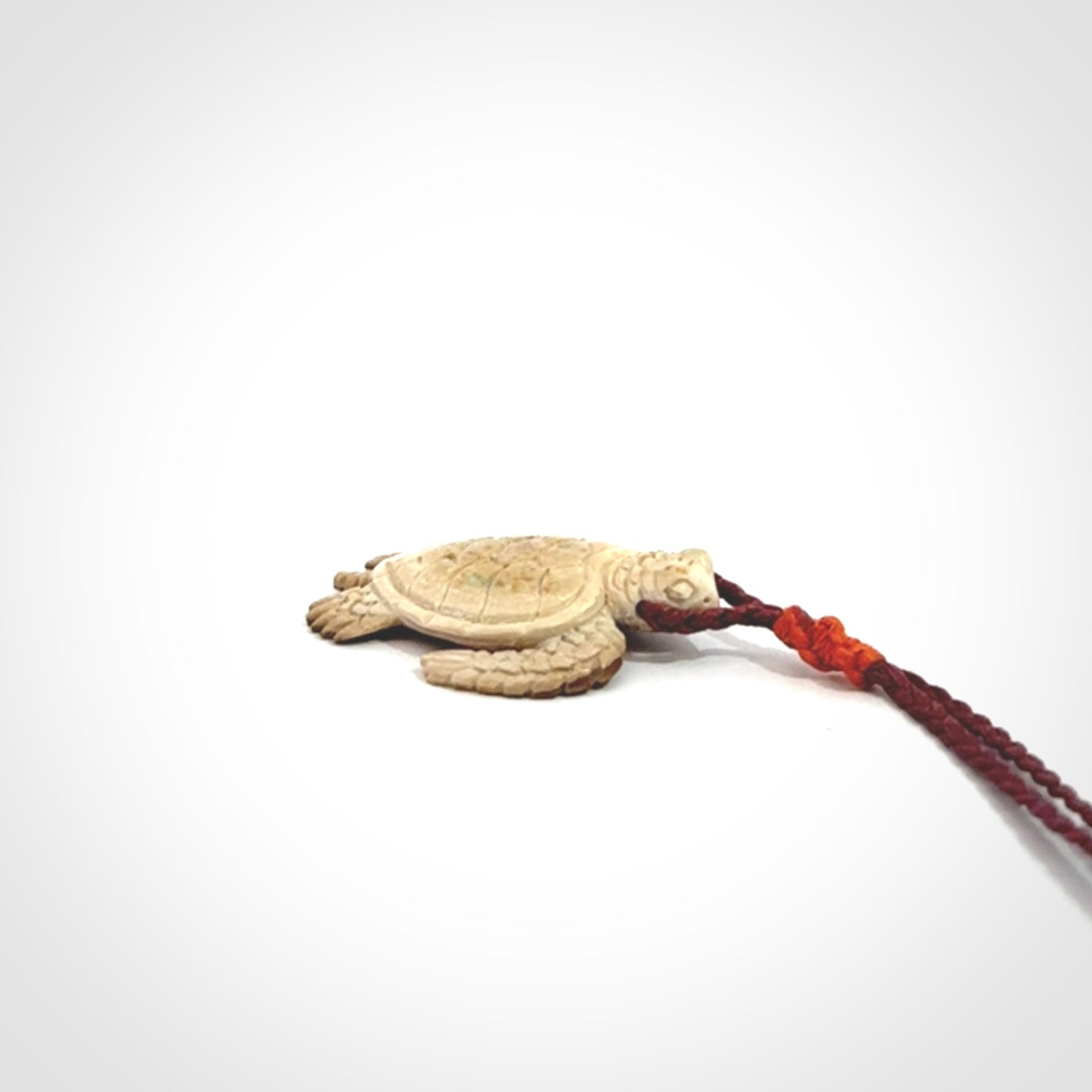 This is a beautiful hand carved woolly mammoth tusk turtle pendant. A really cool piece that is made from this rare and beautiful material. The mammoth has a very distinctive grain and each piece is different. We ship this worldwide and the cost of shipping is included in the price.