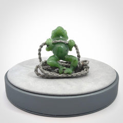 Hand carved jade frog pendant with adjustable cord.