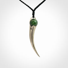 Hand crafted sterling silver with jade huia pendant