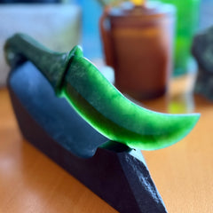 Hand carved large New Zealand Flower Jade knife with koru carving displayed in a Argillite stone stand sculpture. Hand carved here in New Zealand by Ric Moor. This is a 'one only' sculpture, a beautiful display piece.