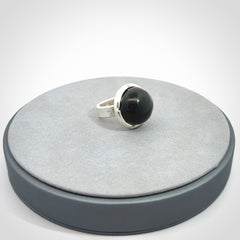 This is a handcrafted New Zealand Pounamu, Jade and sterling silver ring. 