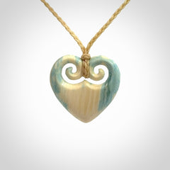 Hand carved heart pendant. Hand made from woolly mammoth tusk. Hand made jewellery for sale online. Rare and unique handmade jewellery. Made by NZ Pacific.