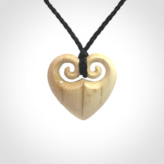 Hand carved heart pendant. Hand made from woolly mammoth tusk. Hand made jewellery for sale online. Rare and unique handmade jewellery. Made by NZ Pacific.