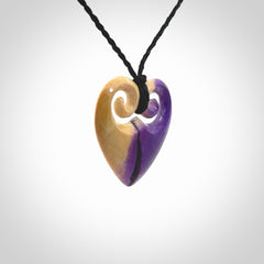 Hand carved heart pendant. Hand made from woolly mammoth tusk. Hand made jewellery for sale online. Rare and unique handmade jewellery. Made by NZ Pacific.