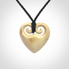 Hand carved heart pendant. Hand made from woolly mammoth tusk. Hand made jewellery for sale online. Rare and unique handmade jewellery. Made by NZ Pacific.
