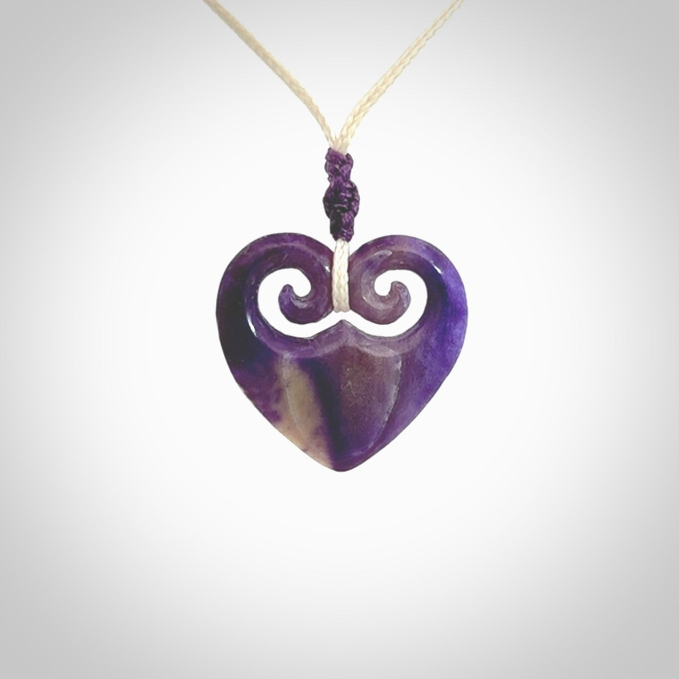 Hand carved heart pendant. Hand made from woolly mammoth tusk. Hand made jewellery for sale online. Rare and unique handmade jewellery. Made by NZ Pacific.