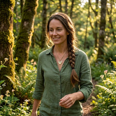 woman wearing bone heart pendant