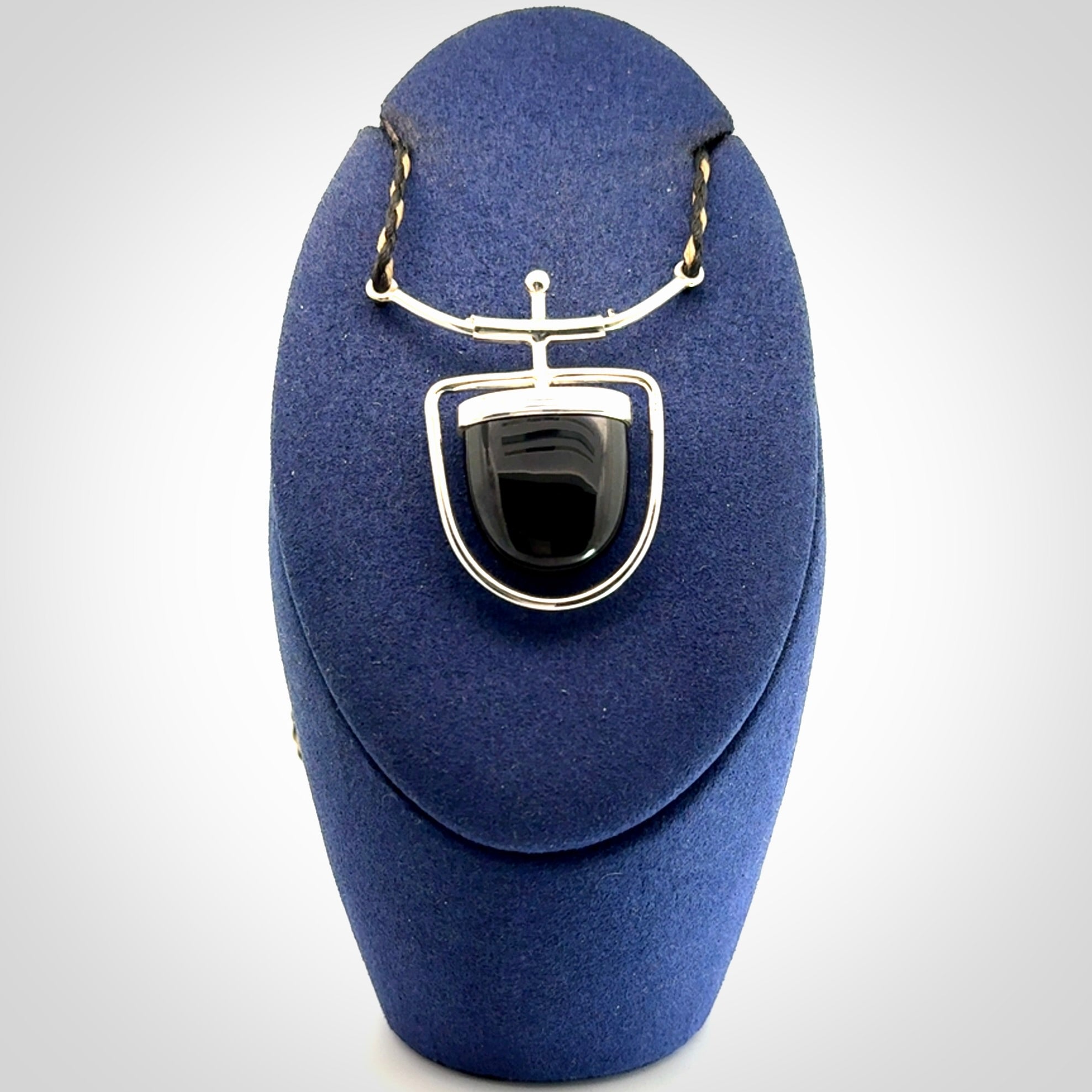 Black jade and silver pendant