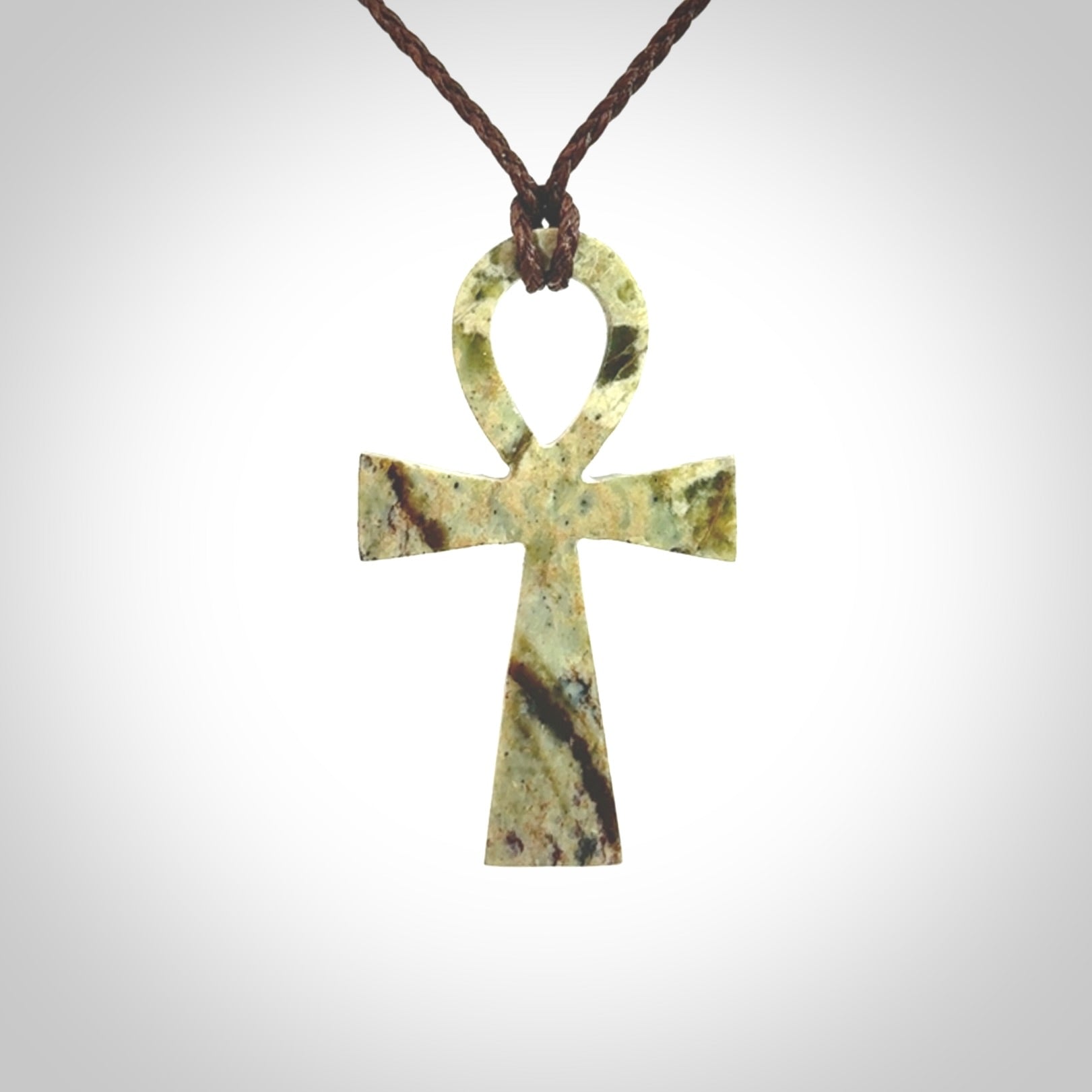 Aceh Jade Stone ankh cross pendant. Handmade jade jewellery made by NZ Pacific and for sale online. Jade stone ankh cross for men and women. Unique art to wear from NZ Pacific.