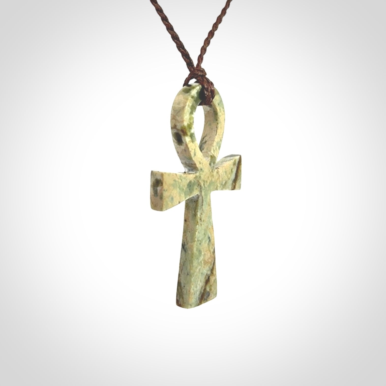 Aceh Jade Stone ankh cross pendant. Handmade jade jewellery made by NZ Pacific and for sale online. Jade stone ankh cross for men and women. Unique art to wear from NZ Pacific.