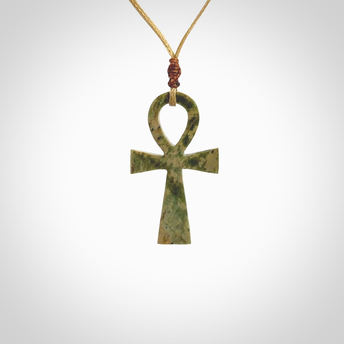 Aceh Jade Stone ankh cross pendant. Handmade jade jewellery made by NZ Pacific and for sale online. Jade stone ankh cross for men and women. Unique art to wear from NZ Pacific.