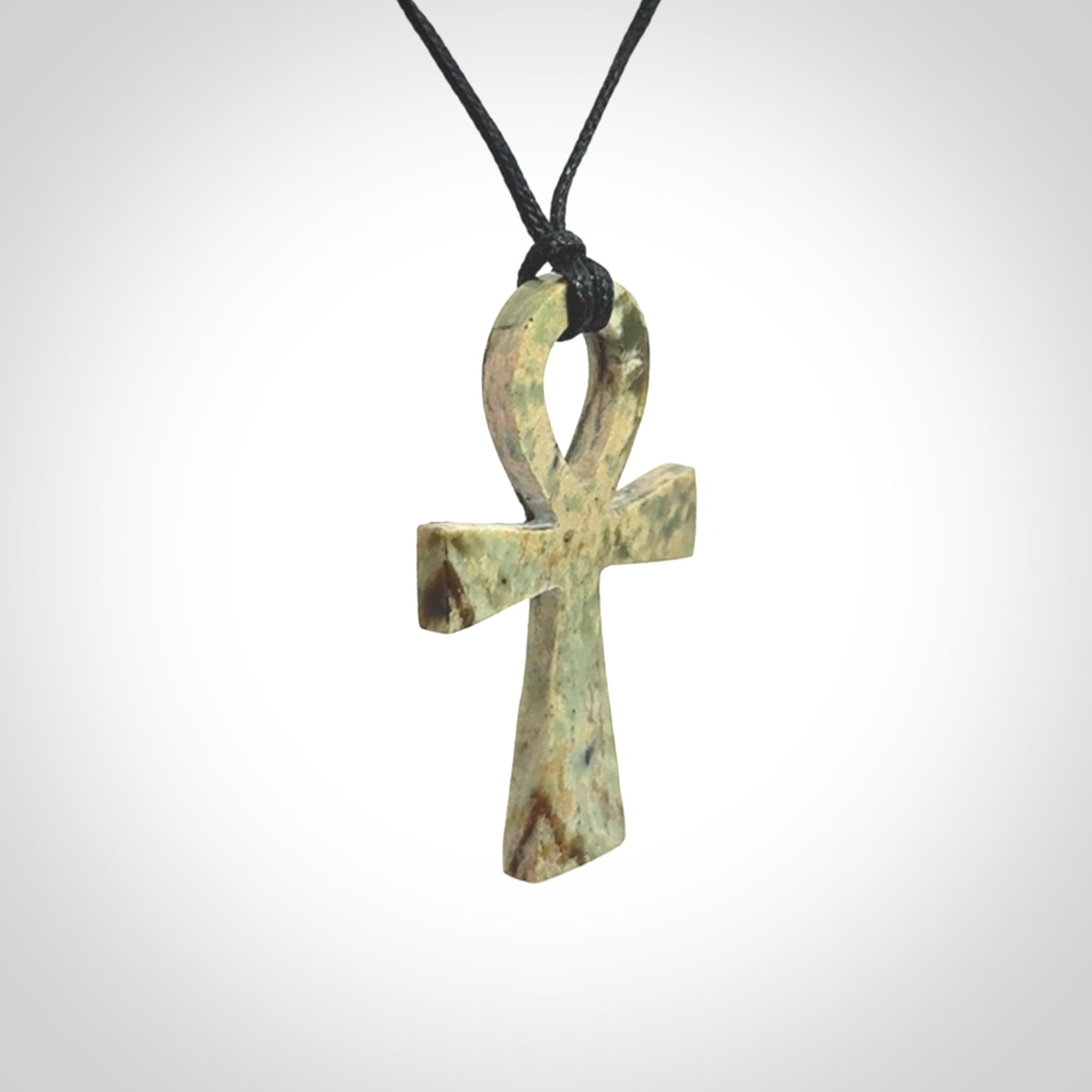 Aceh Jade Stone ankh cross pendant. Handmade jade jewellery made by NZ Pacific and for sale online. Jade stone ankh cross for men and women. Unique art to wear from NZ Pacific.