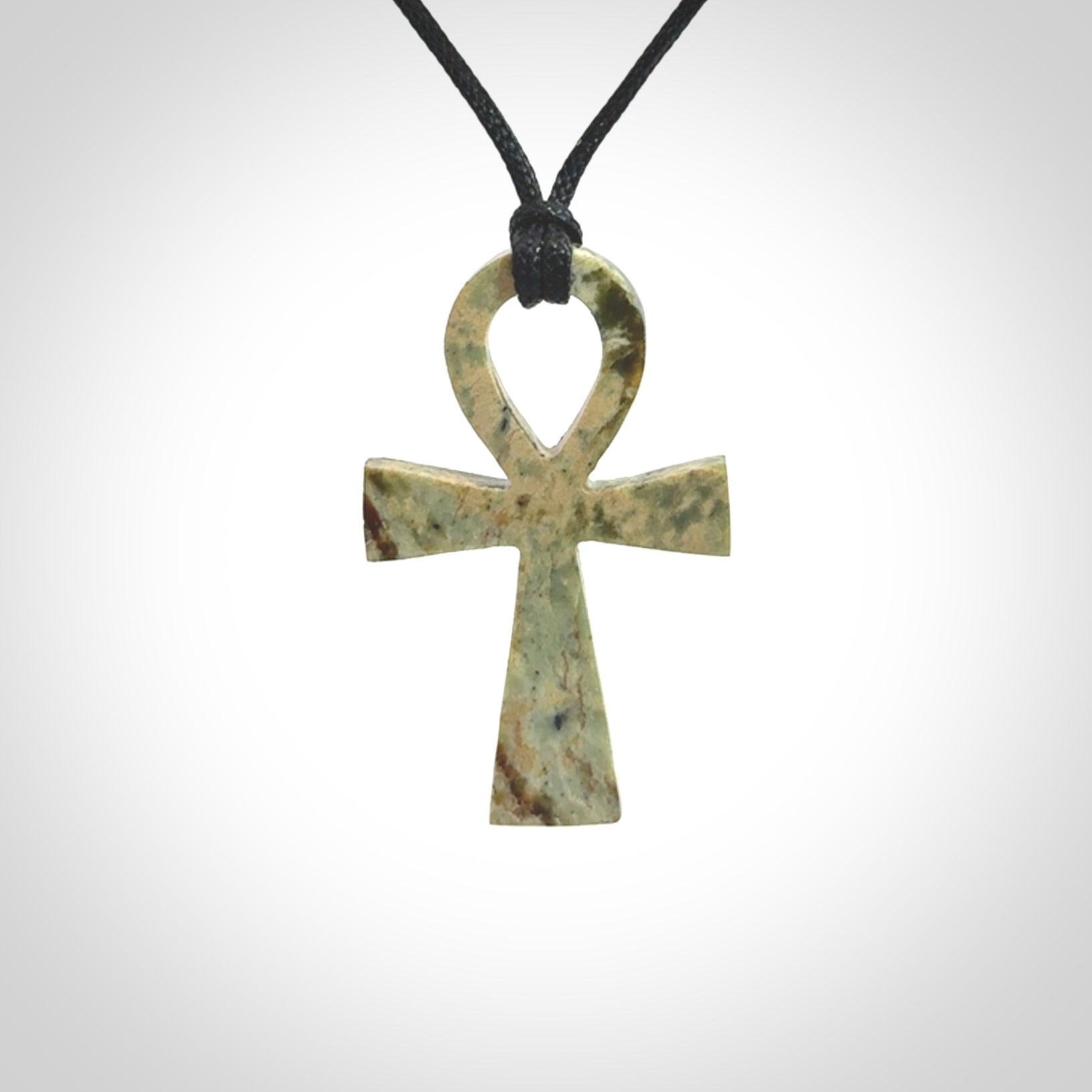 Aceh Jade Stone ankh cross pendant. Handmade jade jewellery made by NZ Pacific and for sale online. Jade stone ankh cross for men and women. Unique art to wear from NZ Pacific.