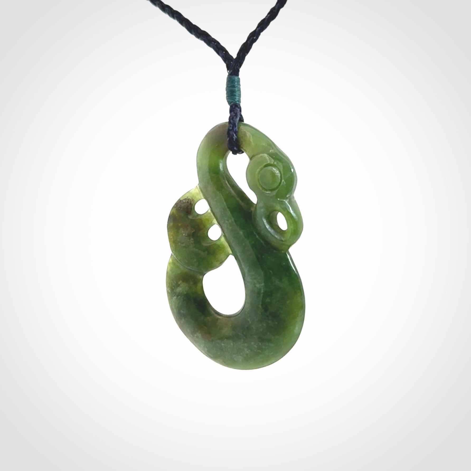 Hand carved New Zealand Jade manaia pendant. Hand made polished Manaia necklace for men and women.