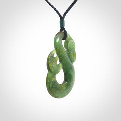 Hand carved New Zealand Jade manaia pendant. Hand made polished Manaia necklace for men and women.