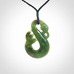 Hand carved New Zealand Jade manaia pendant. Hand made polished Manaia necklace for men and women.
