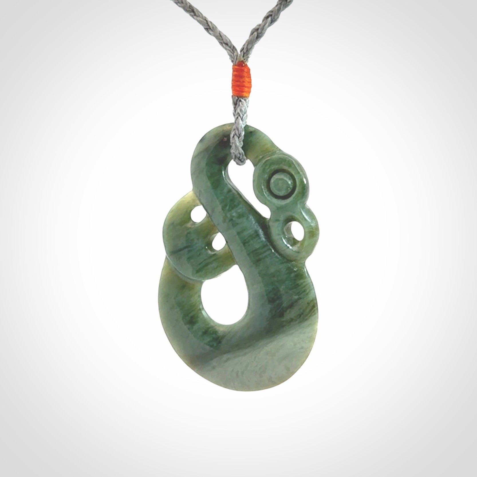 Hand carved New Zealand Jade manaia pendant. Hand made polished Manaia necklace for men and women.