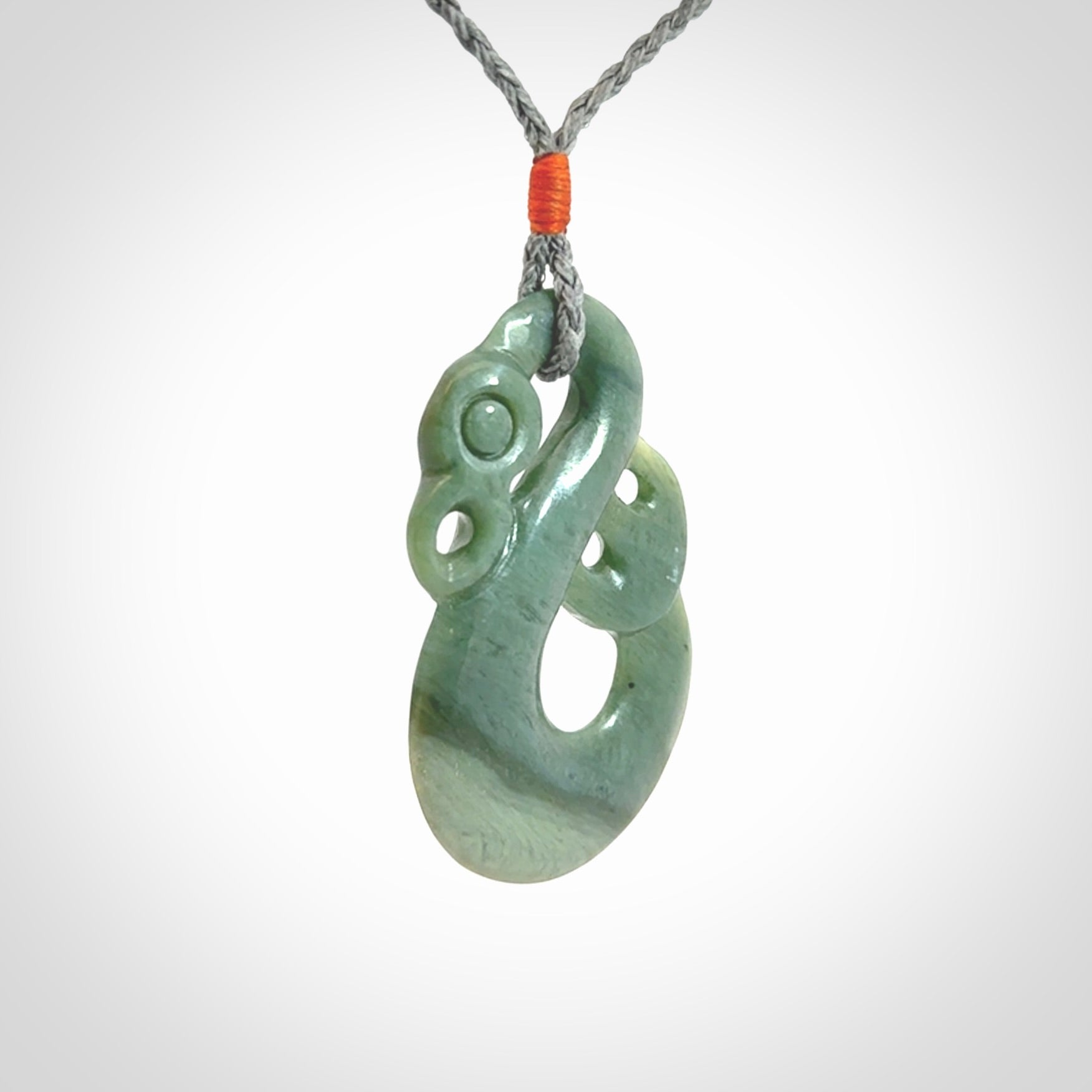 Hand carved New Zealand Jade manaia pendant. Hand made polished Manaia necklace for men and women.