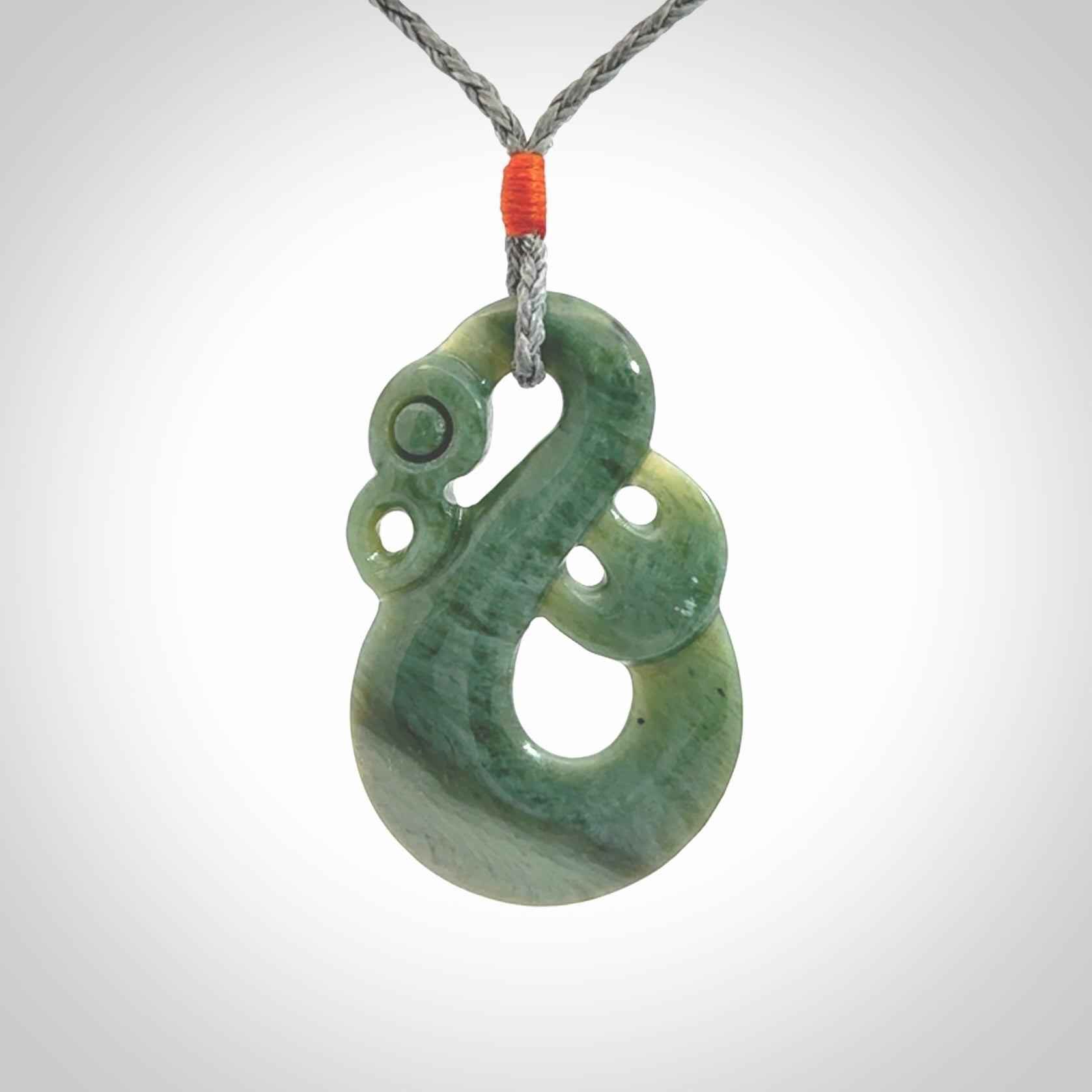 Hand carved New Zealand Jade manaia pendant. Hand made polished Manaia necklace for men and women.