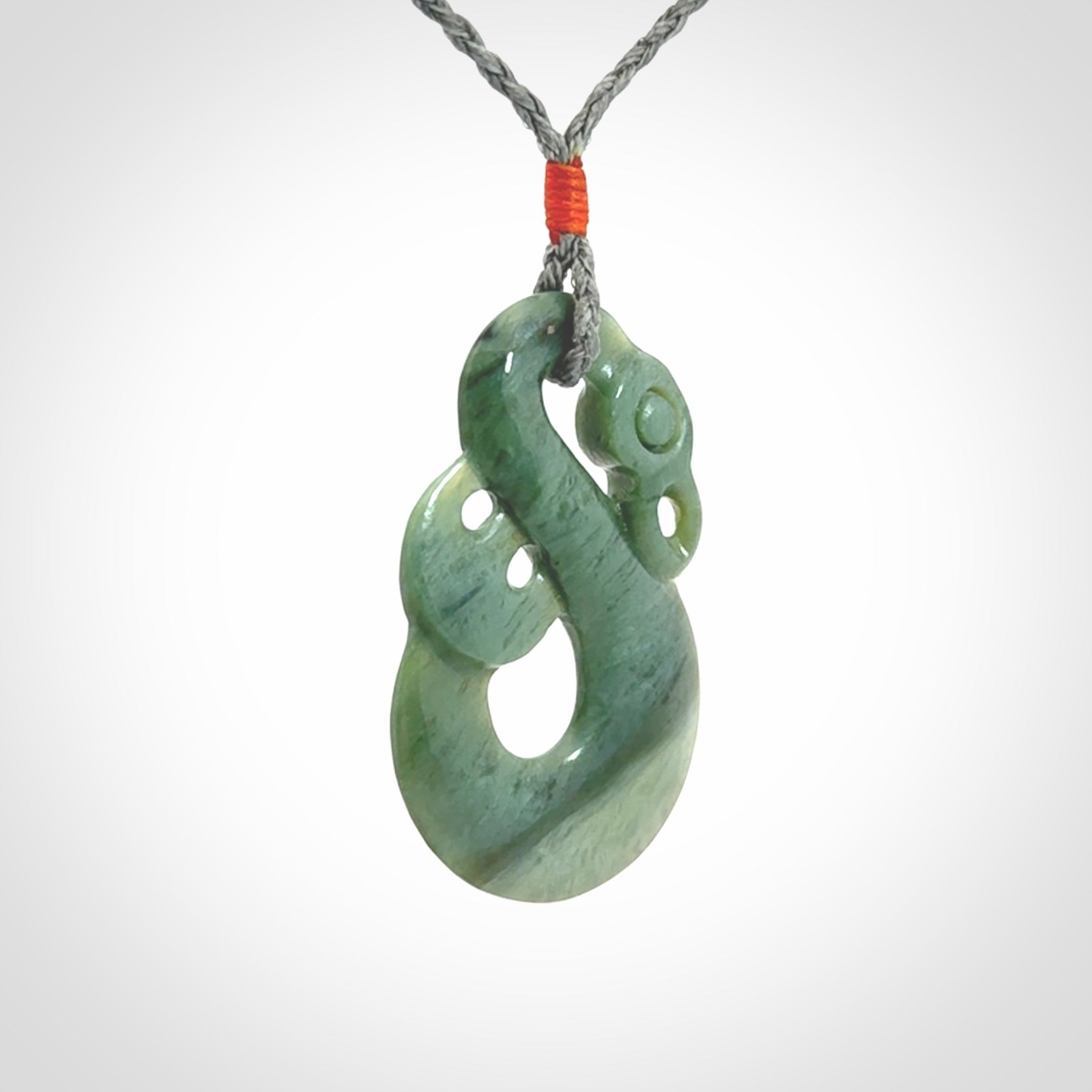 Hand carved New Zealand Jade manaia pendant. Hand made polished Manaia necklace for men and women.