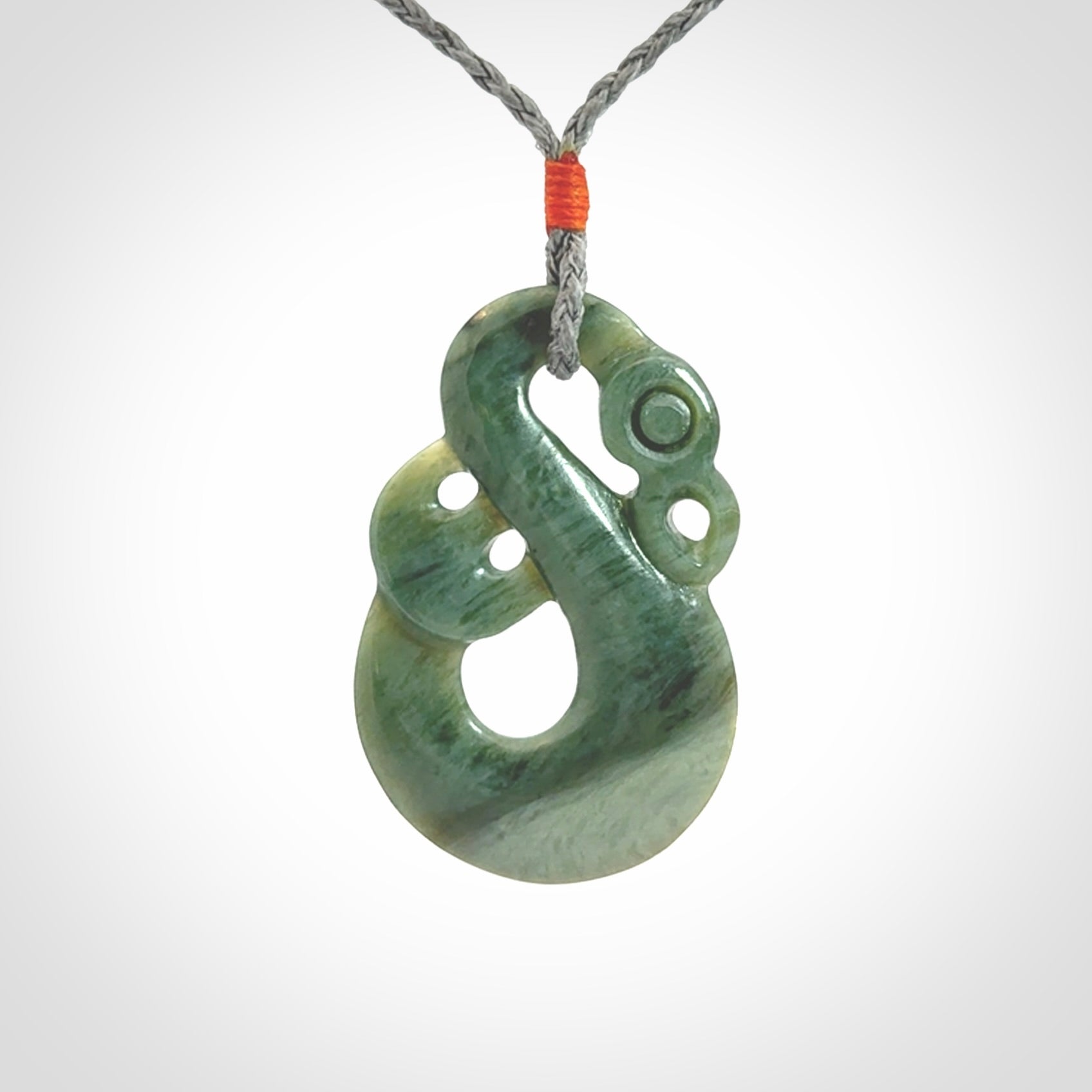 Hand carved New Zealand Jade manaia pendant. Hand made polished Manaia necklace for men and women.