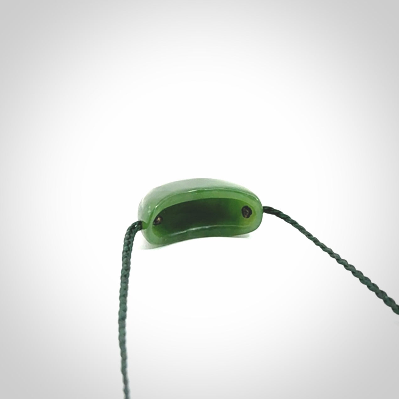 Hand carved jade kete pendant. Kete hand made in British Columbian Jade with adjustable cord. Delivered with Express Courier.