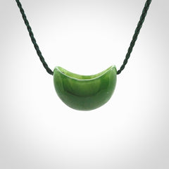 Hand carved jade kete pendant. Kete hand made in British Columbian Jade with adjustable cord. Delivered with Express Courier.
