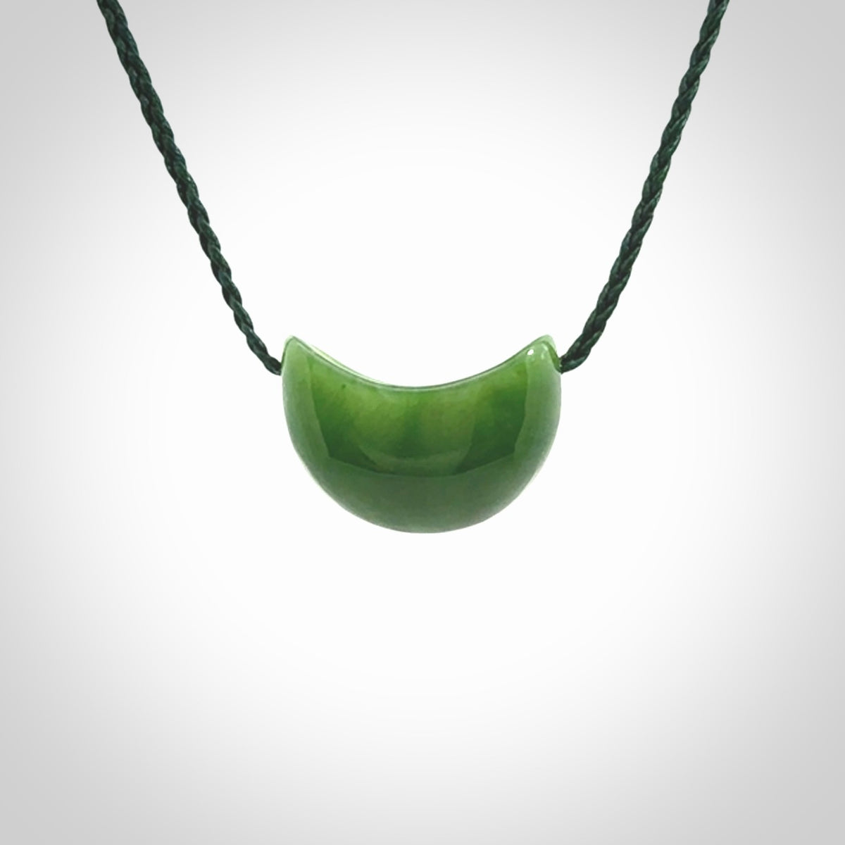 Hand carved jade kete pendant. Kete hand made in British Columbian Jade with adjustable cord. Delivered with Express Courier.