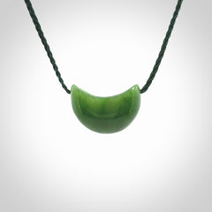 Hand carved jade kete pendant. Kete hand made in British Columbian Jade with adjustable cord. Delivered with Express Courier.
