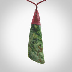 One only larger sized New Zealand jade drop pendant. Hand carved in New Zealand by Ric Moor, jade artist, for NZ Pacific. Provided with plum adjustable cord.