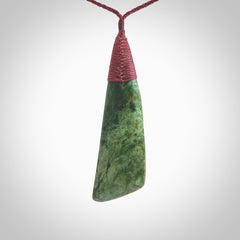 One only larger sized New Zealand jade drop pendant. Hand carved in New Zealand by Ric Moor, jade artist, for NZ Pacific. Provided with plum adjustable cord.