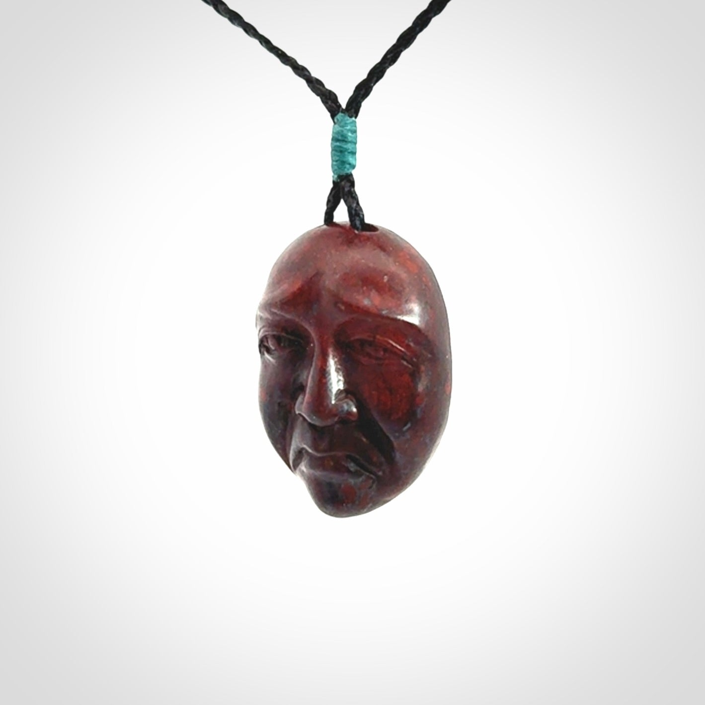 Hand carved jasper stone happy, sad and angry face pendants