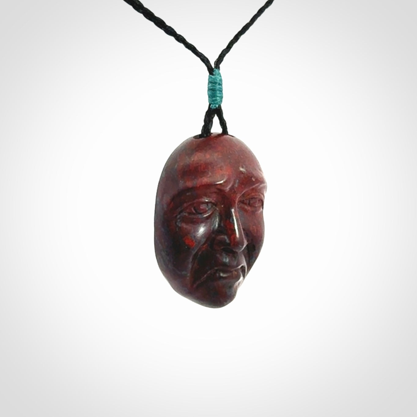 Hand carved jasper stone happy, sad and angry face pendants