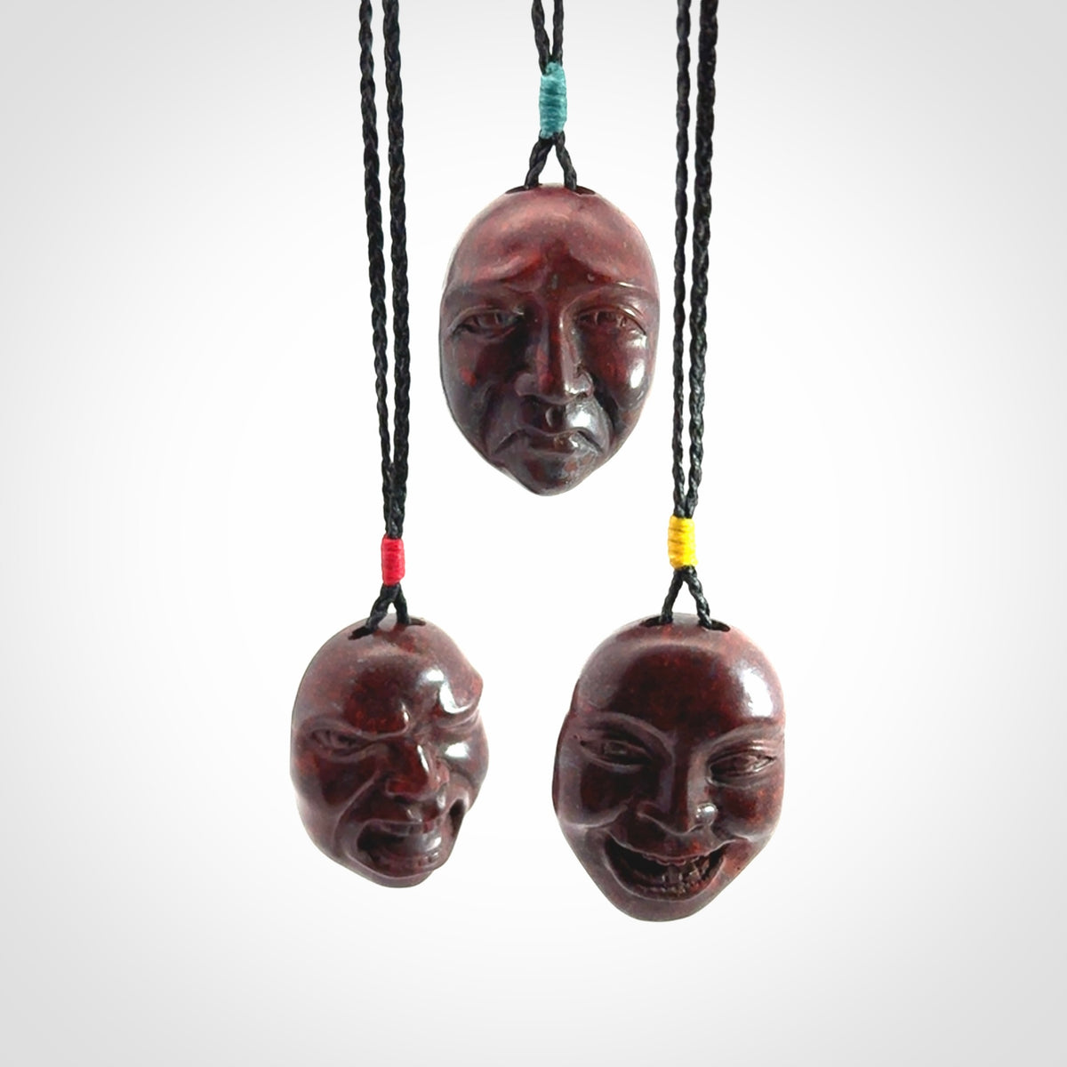 Hand carved jasper stone happy, sad and angry face pendants