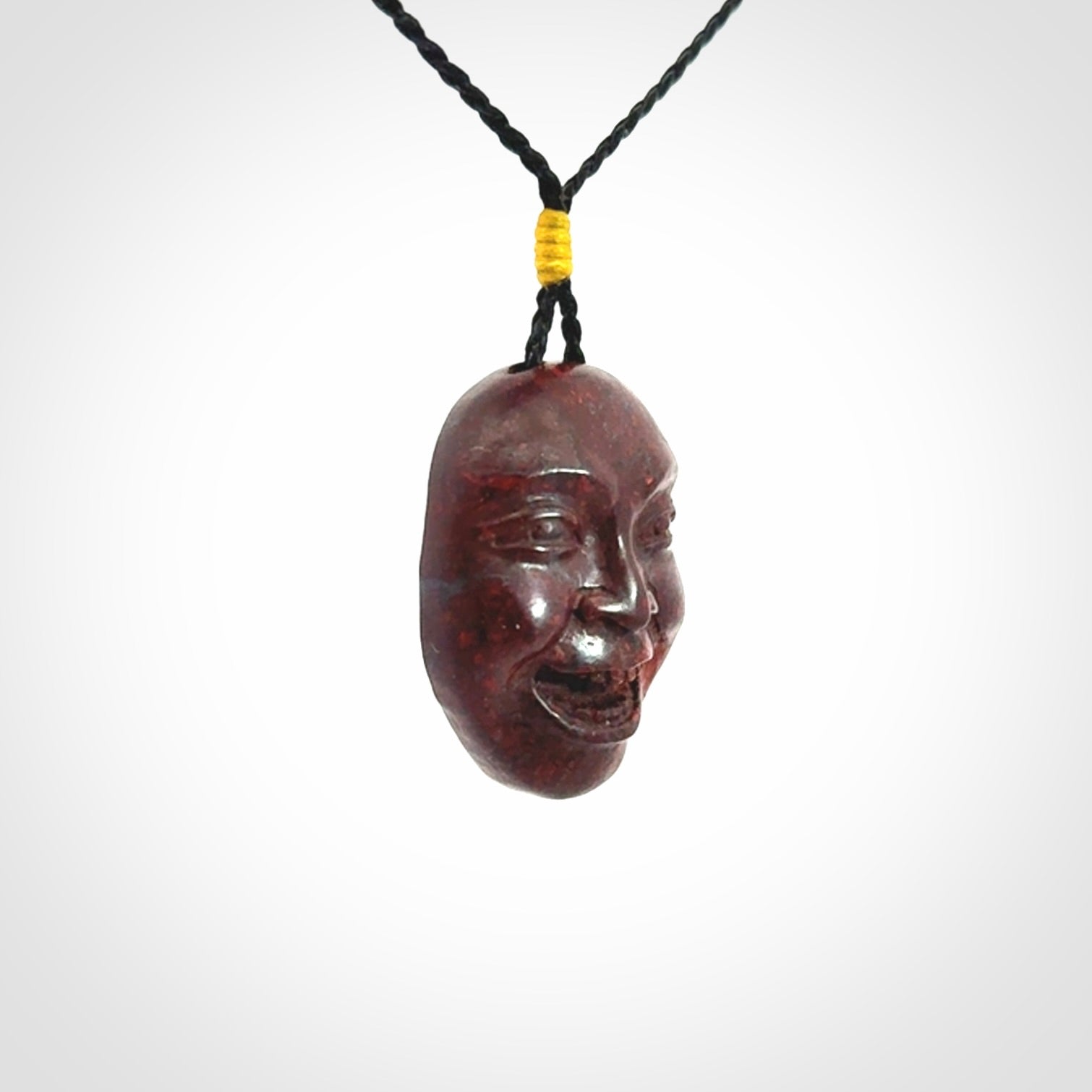 Hand carved jasper stone happy, sad and angry face pendants