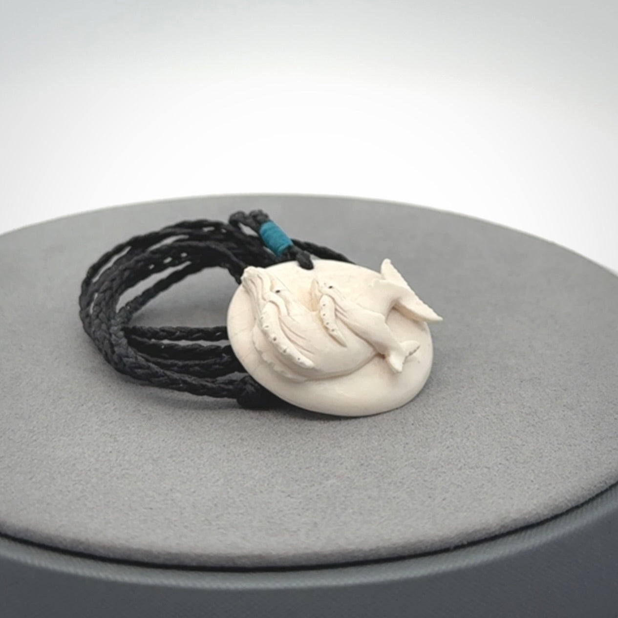 Hand carved woolly mammoth tusk whale pendant