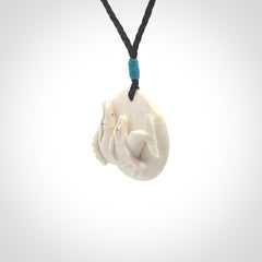 Hand carved woolly mammoth tusk whale pendant