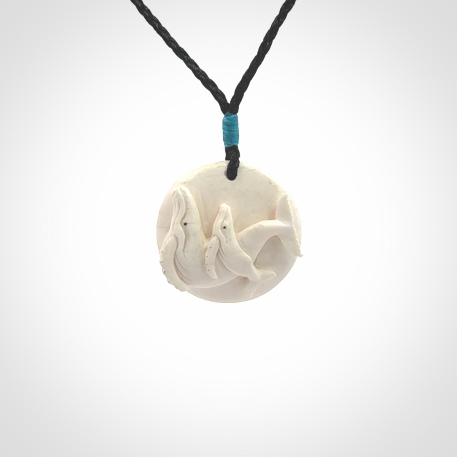 Hand carved woolly mammoth tusk whale pendant