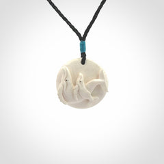Hand carved woolly mammoth tusk whale pendant