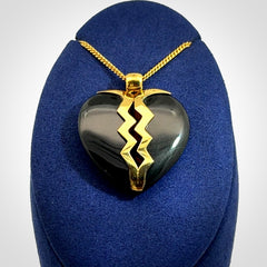 This is a handcarved love heart pendant made from a gorgeous and striking piece of Black Jade with gold plated silver. This is a superbly carved and very unique piece if custom jewellery. For sale online from NZ Pacific.