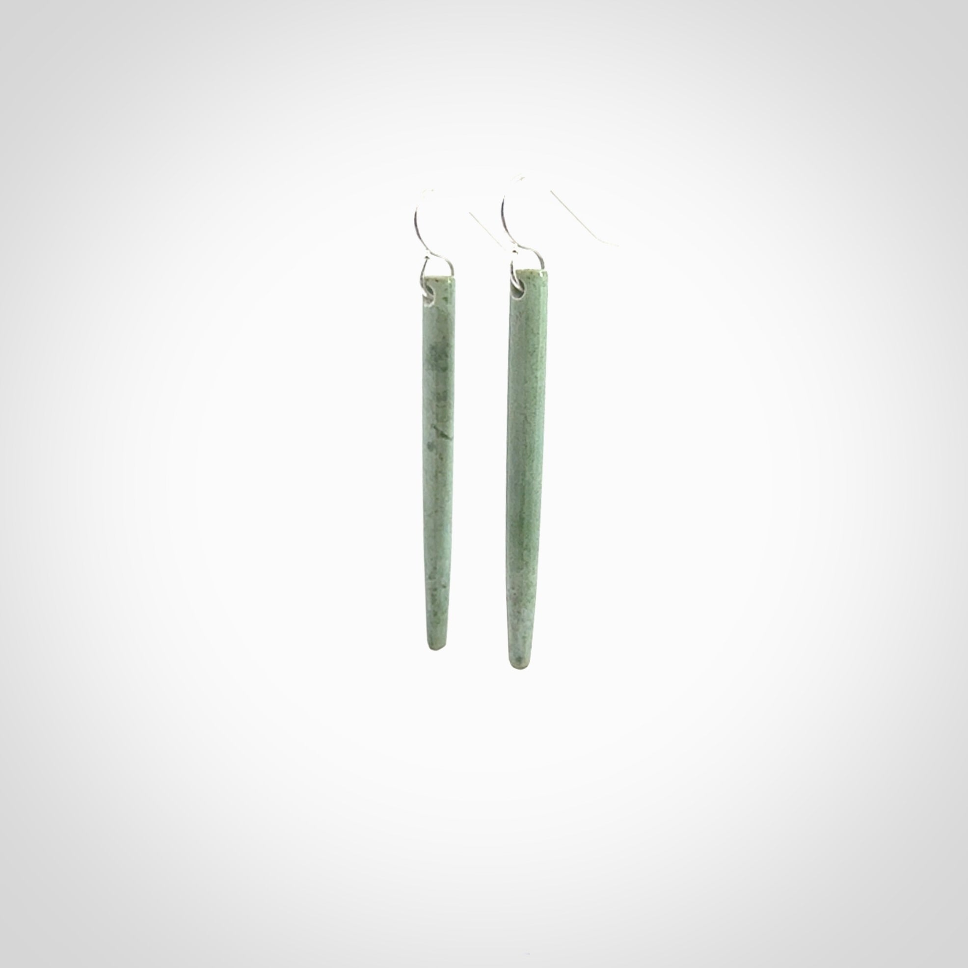 Hand crafted New Zealand Jade Inanga Jade drop earrings with Sterling Silver Hooks. Jade drop earrings, packaged in a woven kete pouch.