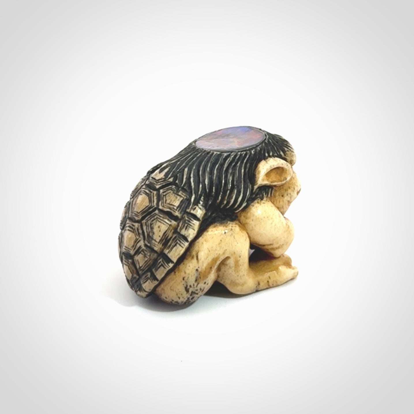 Hand carved incredible Kappa holding cucumber carving in deer antler with paua shell and buffalo horn. A one off collectors item that has been hand crafted to be displayed.